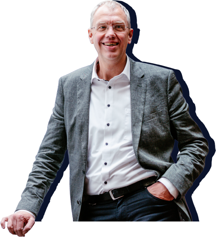 Dr.-Ing. Dirk Peters, lächelnd, in grauem Sakko und weißem Hemd
